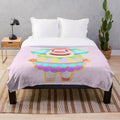 Pietro the sheep villager from Animal Crossing on a plush pastel blanket