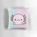 Soft, pink axolotl-shaped pillow with a playful, doodle-like design, perfect for adding a touch of cuteness to any room.