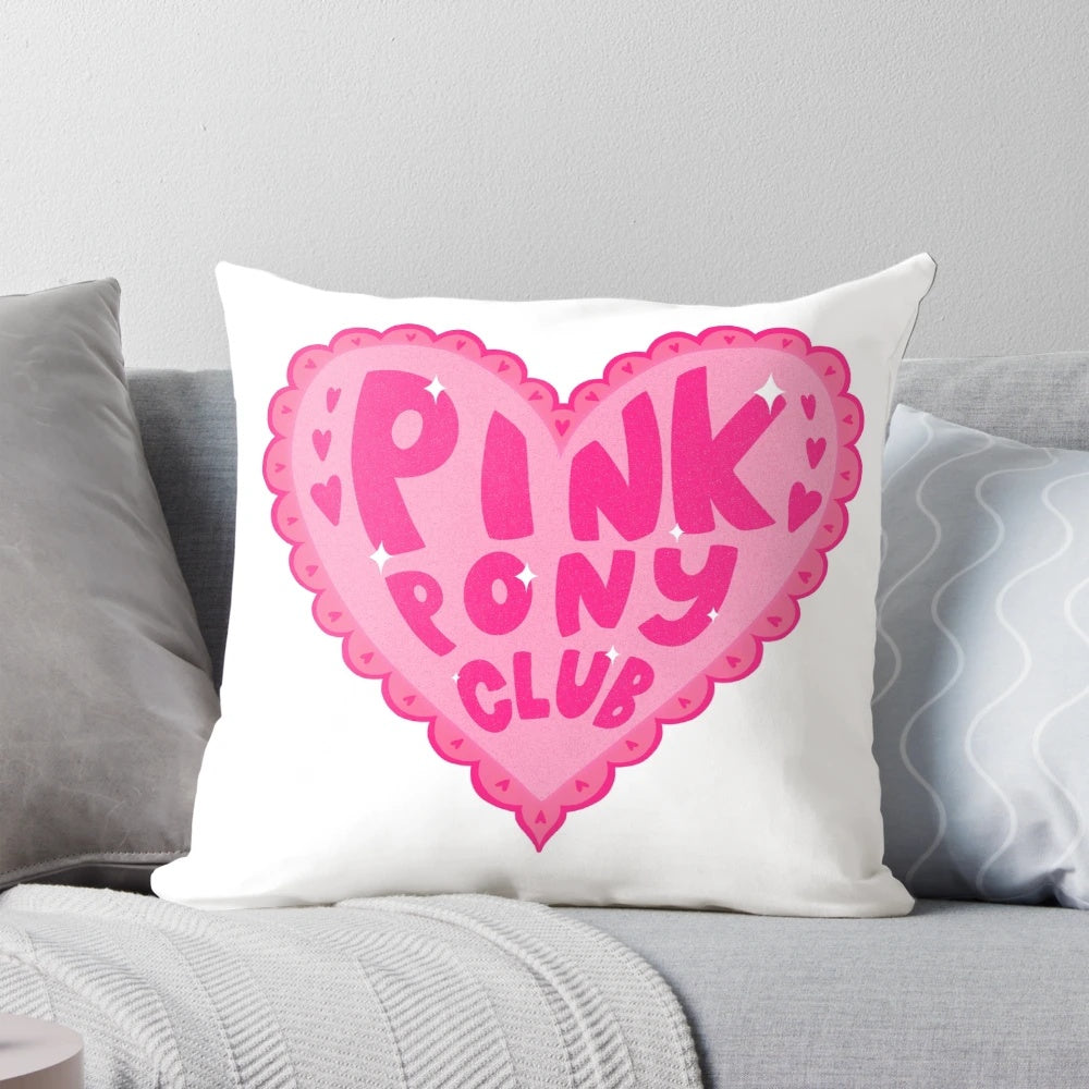 Soft, pink pillow with a sticker design inspired by the Chappell Roan song "Pink Pony Club".