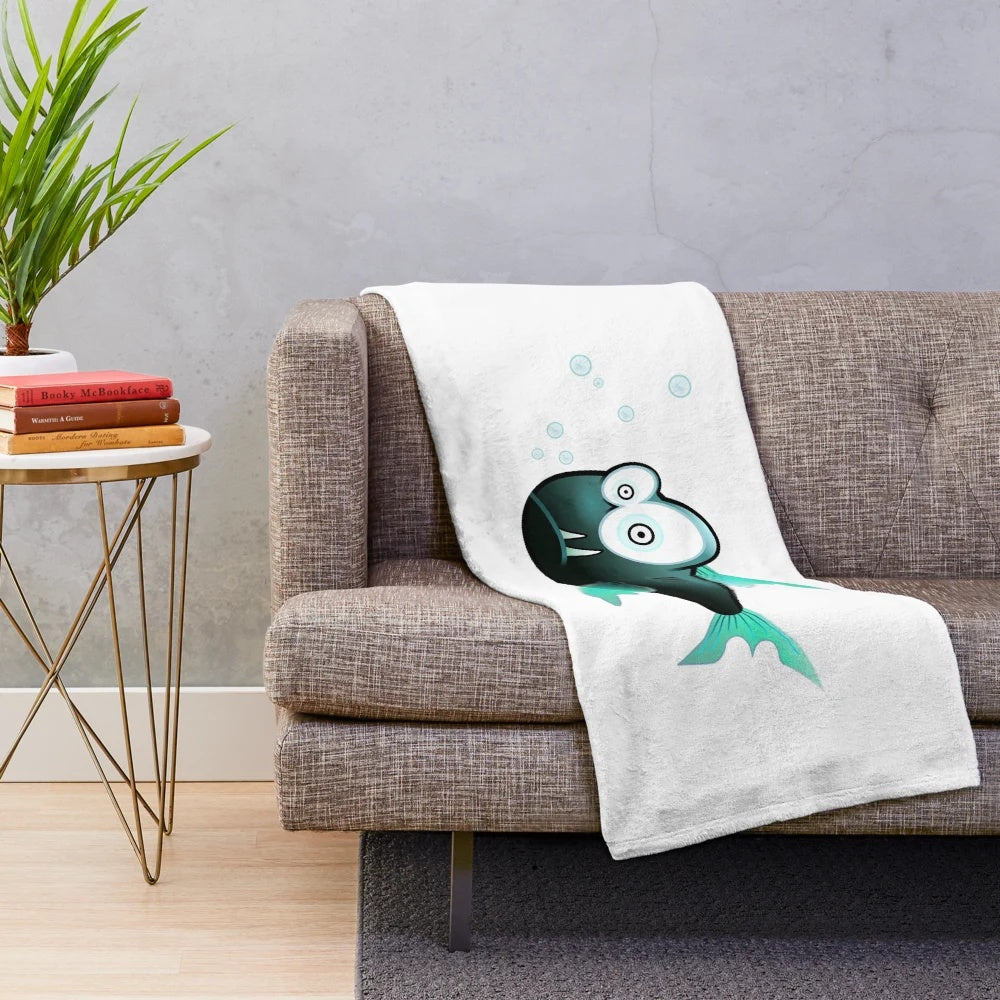 Soft and cuddly plush blanket featuring a playful piranha fish design