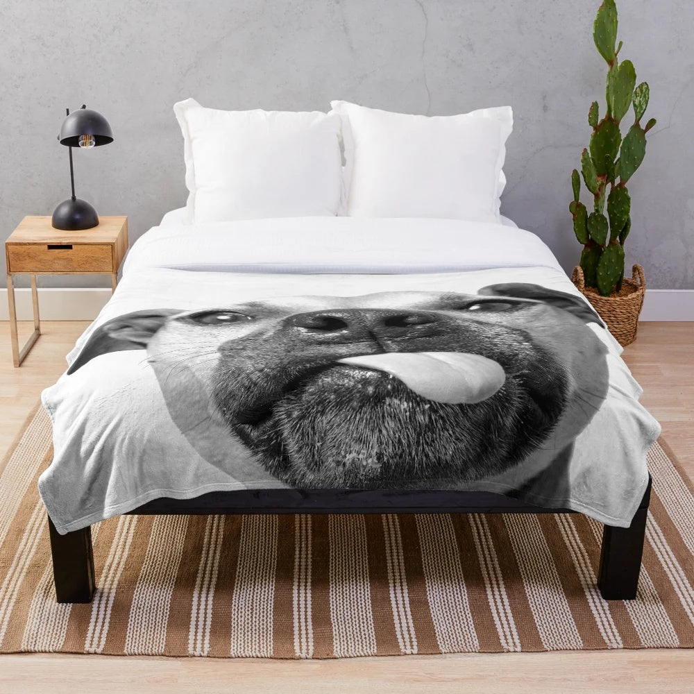 Soft and cuddly pit bull plush blanket with a cute dog kiss design