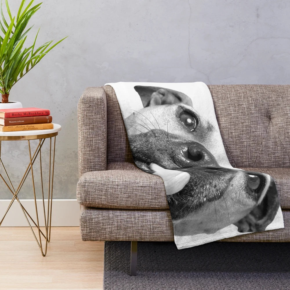 Soft and cuddly pit bull plush blanket with a cute dog kiss design