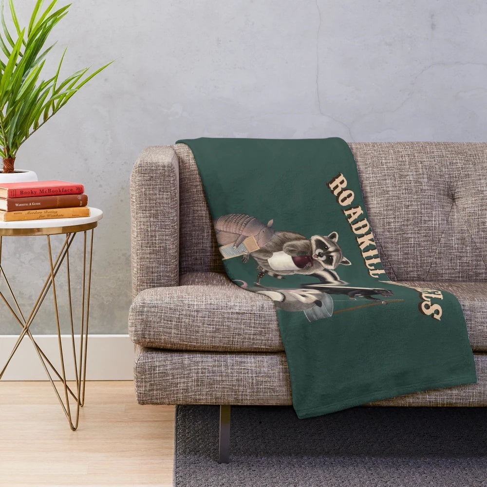 Plush blanket with animals playing musical instruments, including a possum on banjo, raccoon on washboard, and skunk on jug