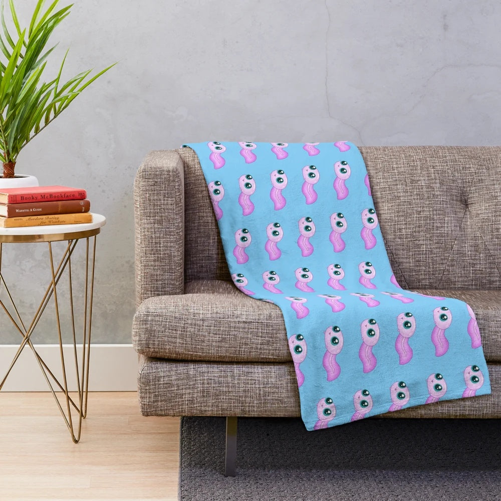 Soft and cuddly plush tadpole blanket for a whimsical touch