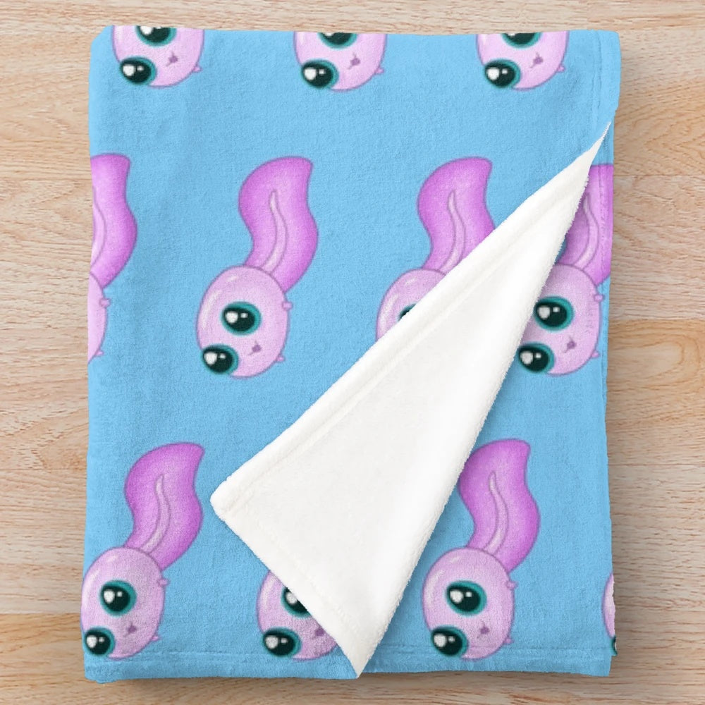 Soft and cuddly plush tadpole blanket for a whimsical touch