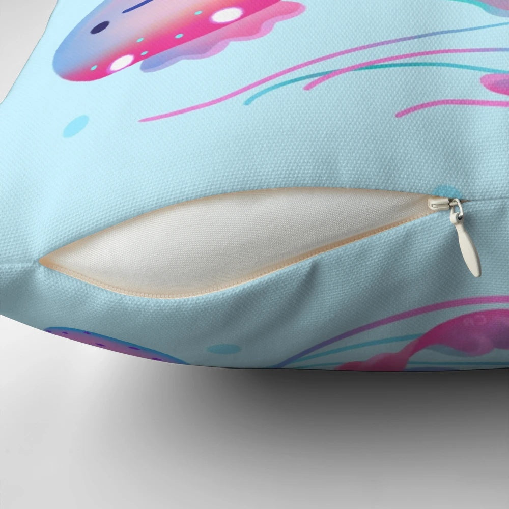 Polka dot jellyfish-themed accent pillow in pastel pink and blue colors