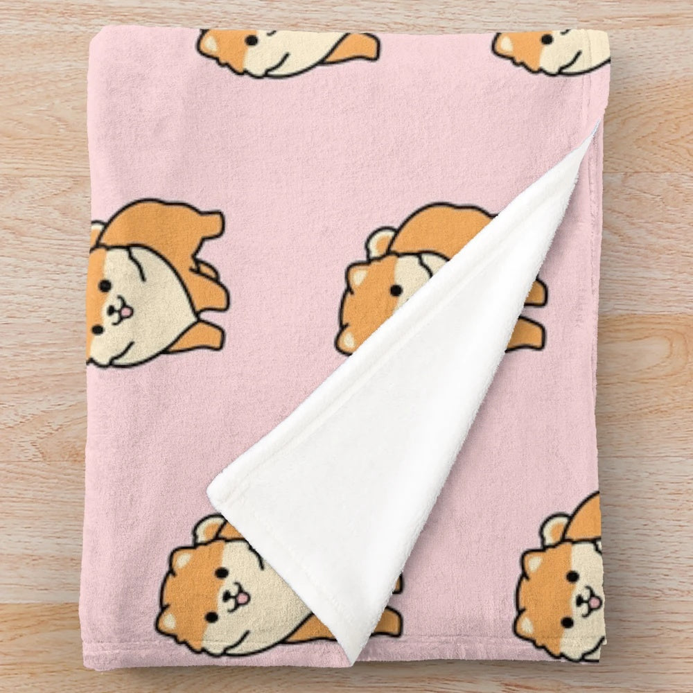 Pomeranian puppy printed on a soft, cozy plush blanket