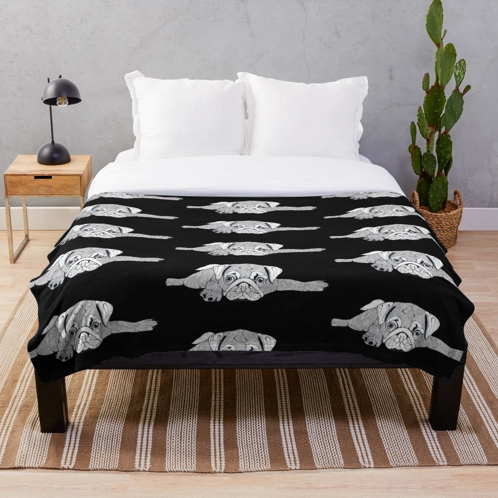 Soft, plush blanket featuring a cute, sleeping pug design