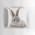 Soft and cuddly rabbit-shaped pillow with a sweet, minimalist design