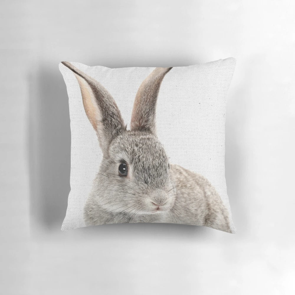 Soft and cuddly rabbit-shaped pillow with a sweet, minimalist design