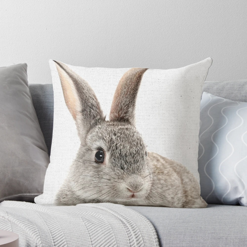 Soft and cuddly rabbit-shaped pillow with a sweet, minimalist design