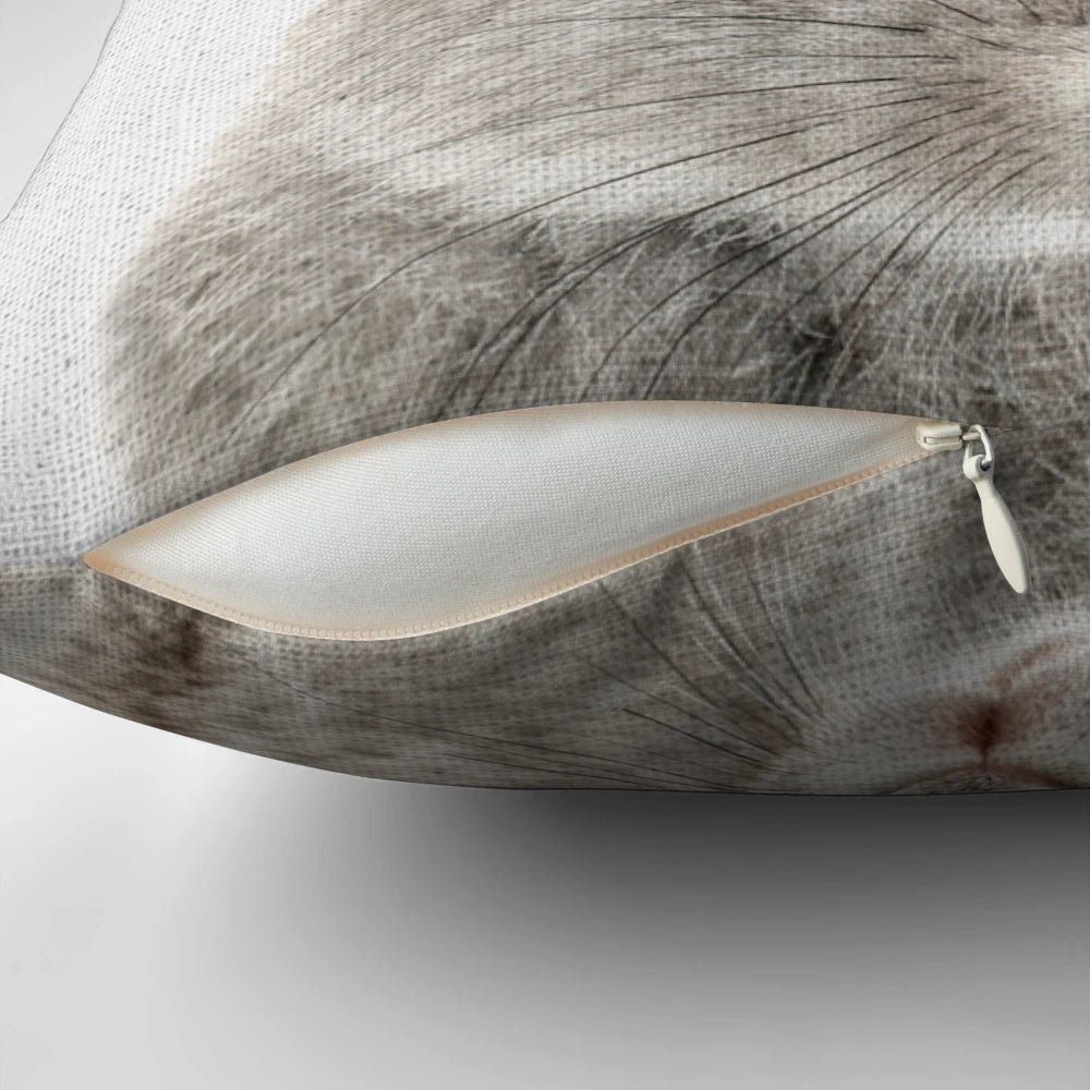 Soft and cuddly rabbit-shaped pillow with a sweet, minimalist design