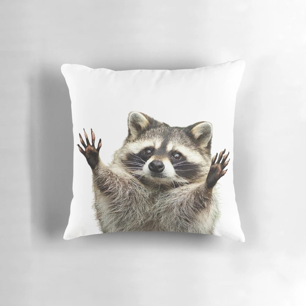 Soft and cuddly racoon-shaped pillow perfect for nursery or children's room