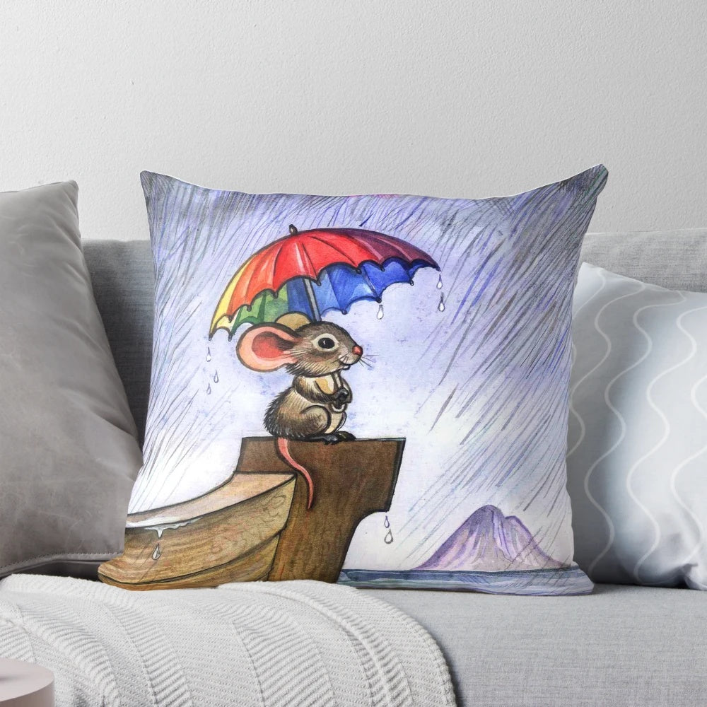 A colorful, whimsical mouse-shaped pillow in a rainbow pattern, providing a touch of vintage-inspired charm.