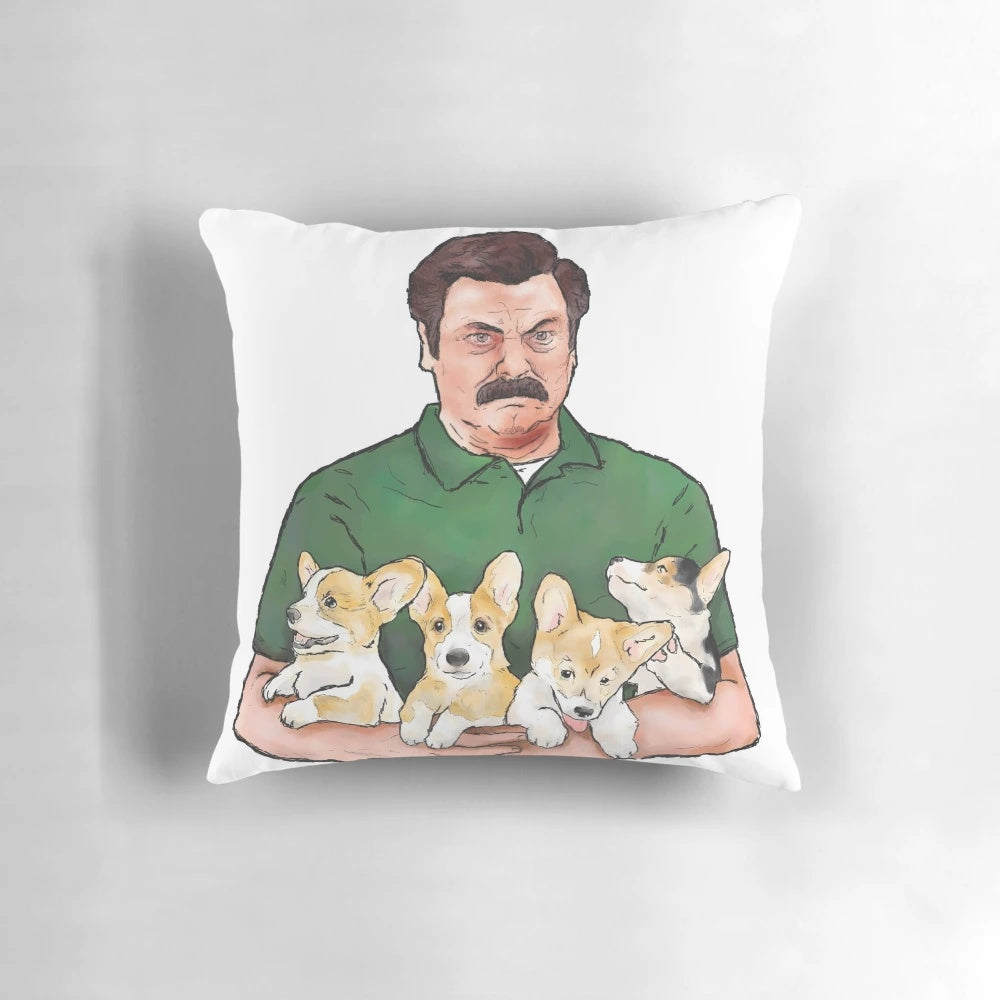Playful corgi puppies being held by a gruff-looking Ron Swanson from the TV show Parks and Recreation.