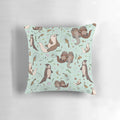 Soft, plush pillow featuring a playful sea otter design, perfect for nature and animal lovers.