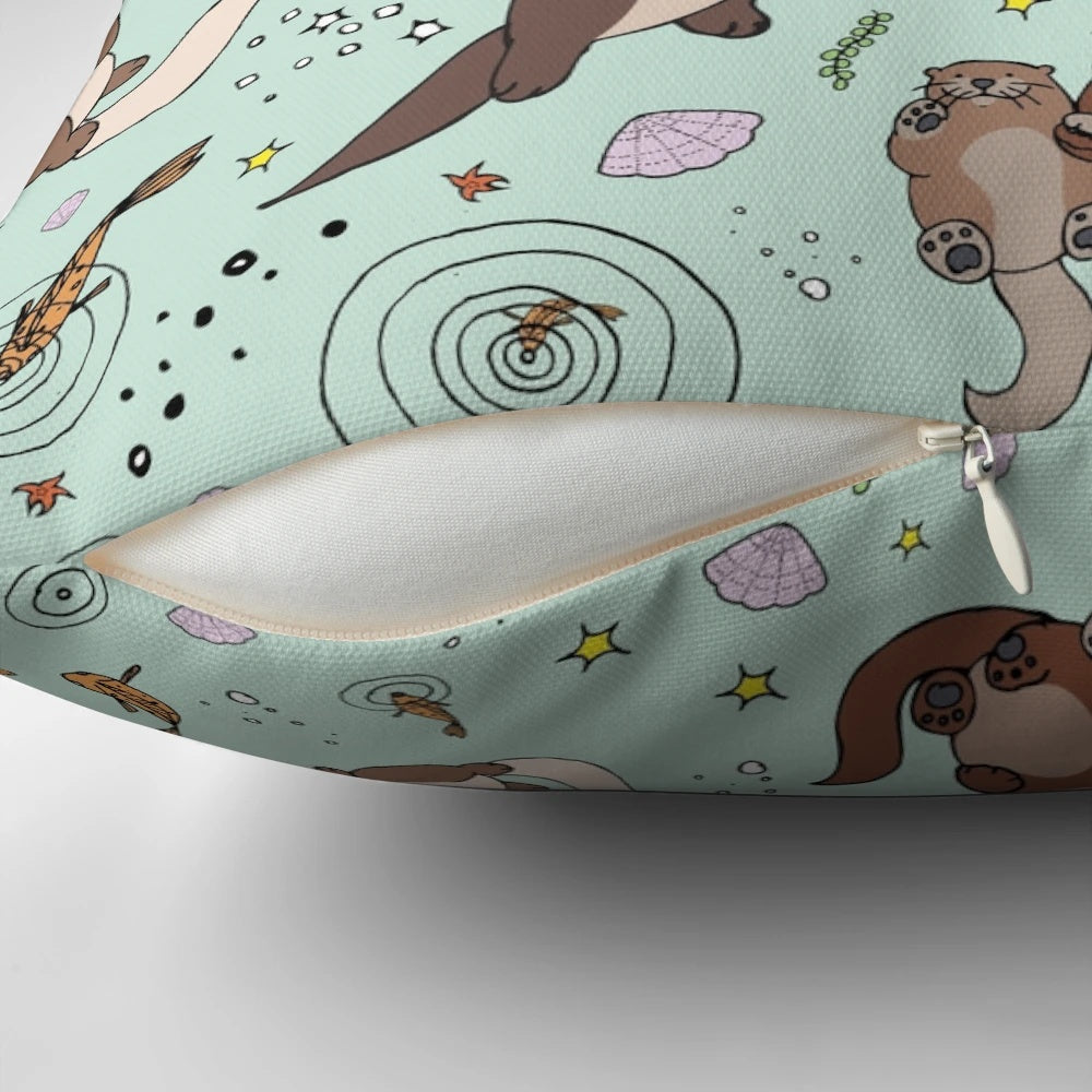 Soft, plush pillow featuring a playful sea otter design, perfect for nature and animal lovers.