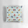 Illustration of two cute, chubby sea otters wearing a plaid, flannel pattern on a decorative pillow.