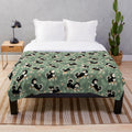 Playful black and tan Shiba Inu pattern plush blanket