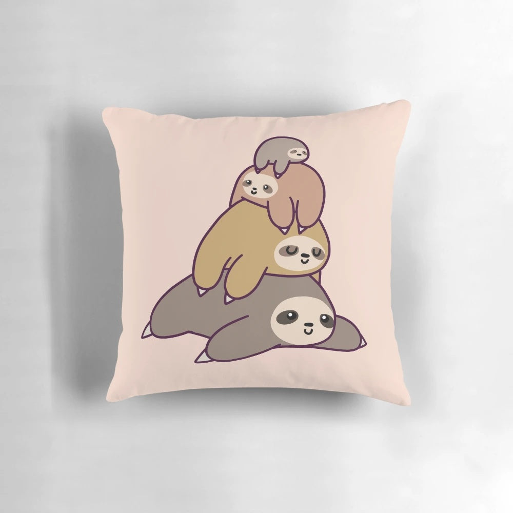 Charming illustration of a stack of cute, cartoon-style sloths in a pillow design.