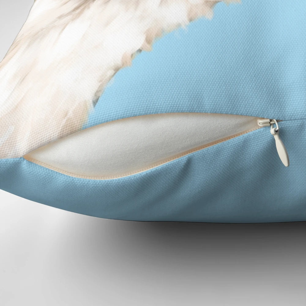 A cute and whimsical pillow featuring a sneaky llama blowing bubble gum in shades of blue and pink.