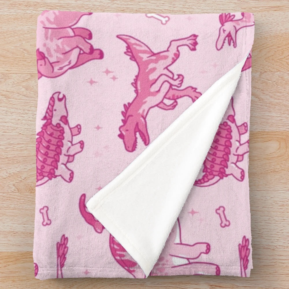 Sparkly dinosaur plush blanket featuring a seamless pattern of cute jurassic animals