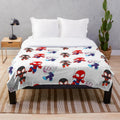 Plush blanket featuring a variety of spider-themed designs, including black spidey and cute cartoon spiders