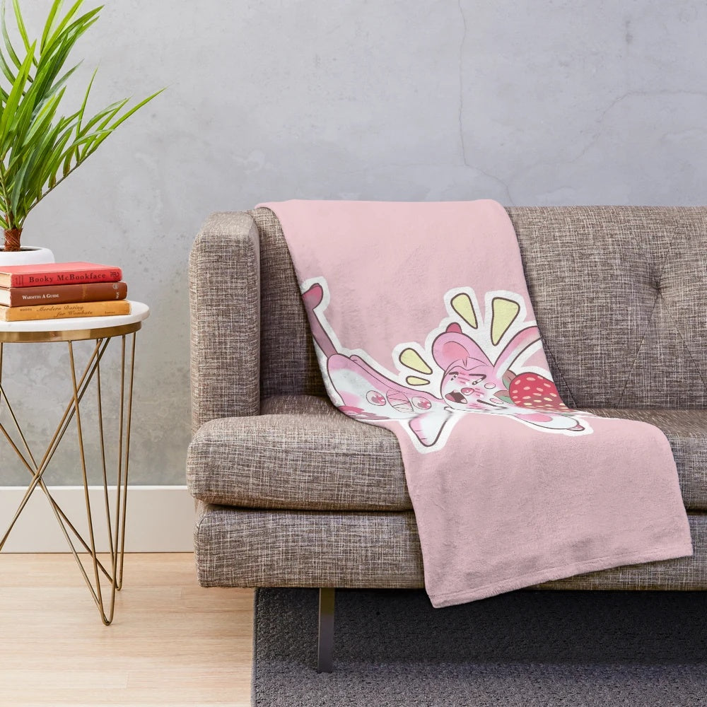 Soft and cuddly strawberry plush blanket with a kawaii cartoon design