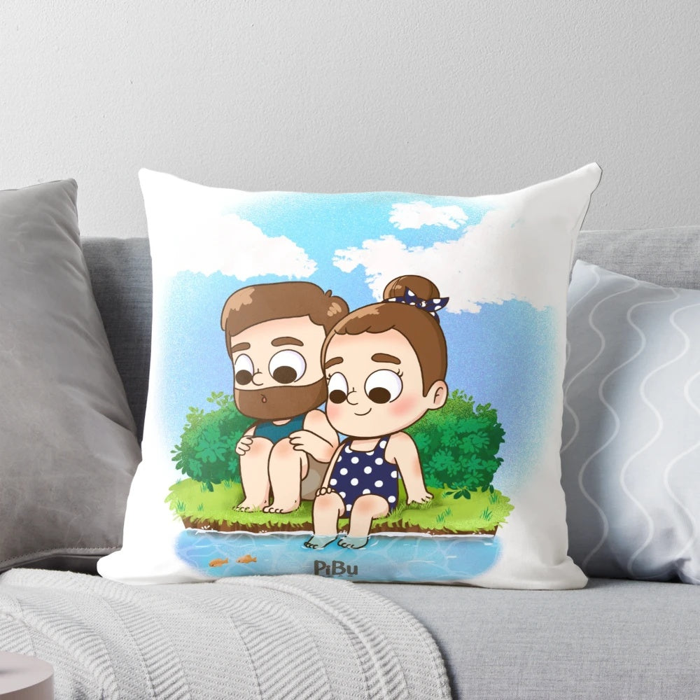 Two people cuddling on a beach with a colorful, kawaii-style pillow