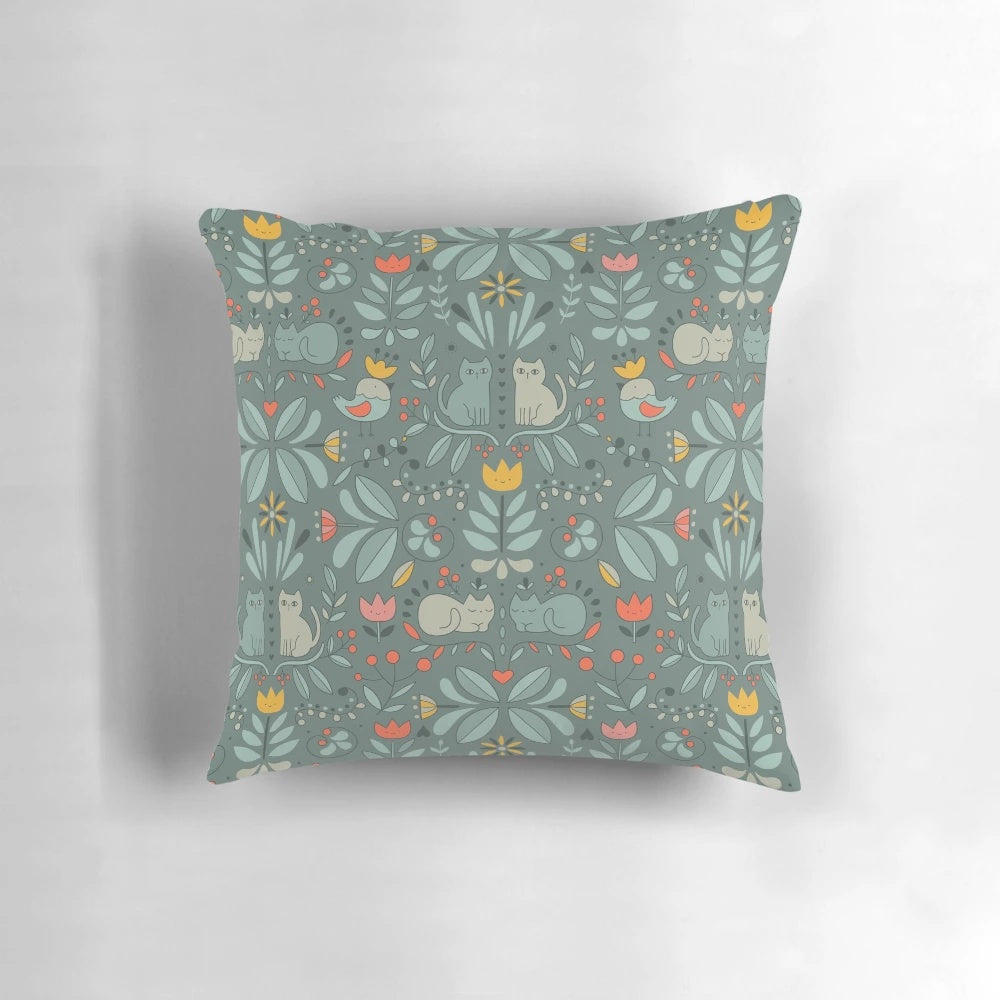 Whimsical illustration of colorful, cartoon-style Swedish folk cats on a decorative pillow.