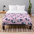 Soft and cuddly plush blanket featuring a cute tapir with a heart pattern design