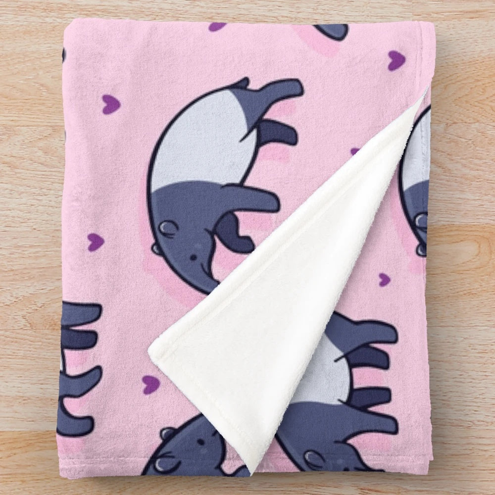 Soft and cuddly plush blanket featuring a cute tapir with a heart pattern design