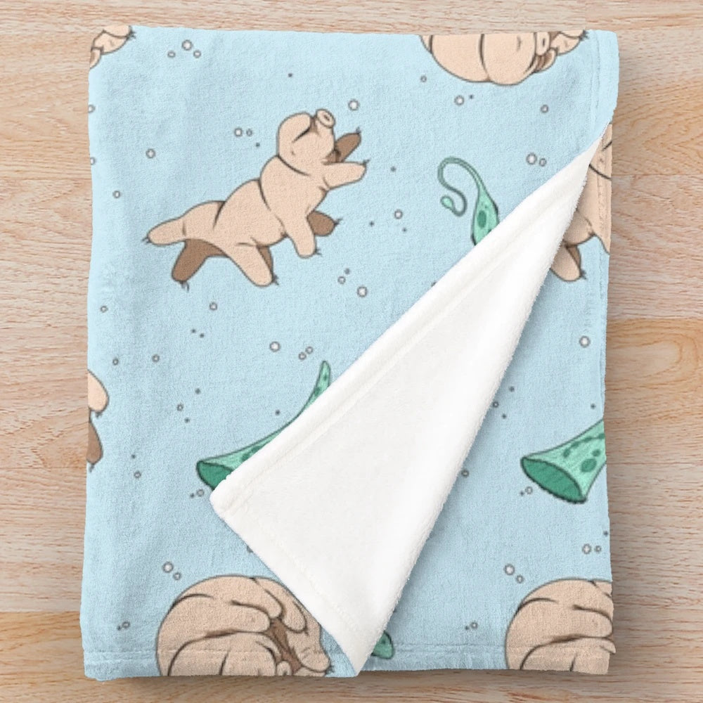 Tardigrades and other cute microscopic animals printed on a soft, plush blanket