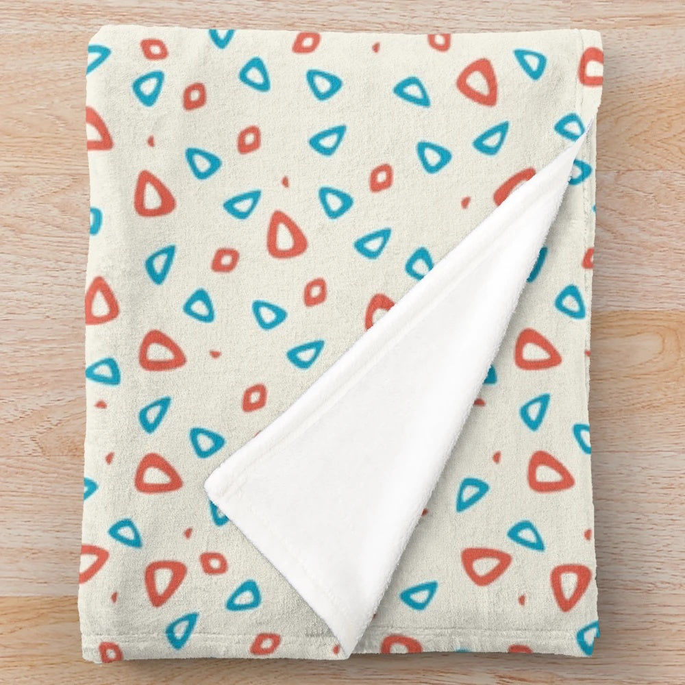 Togepi-inspired plush blanket with soft, cozy egg pattern design