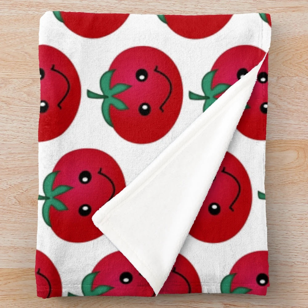 Tomato plush blanket with a cute smiling design