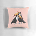 Soft, pink toucan plush pillow with two toucans hugging and cuddling