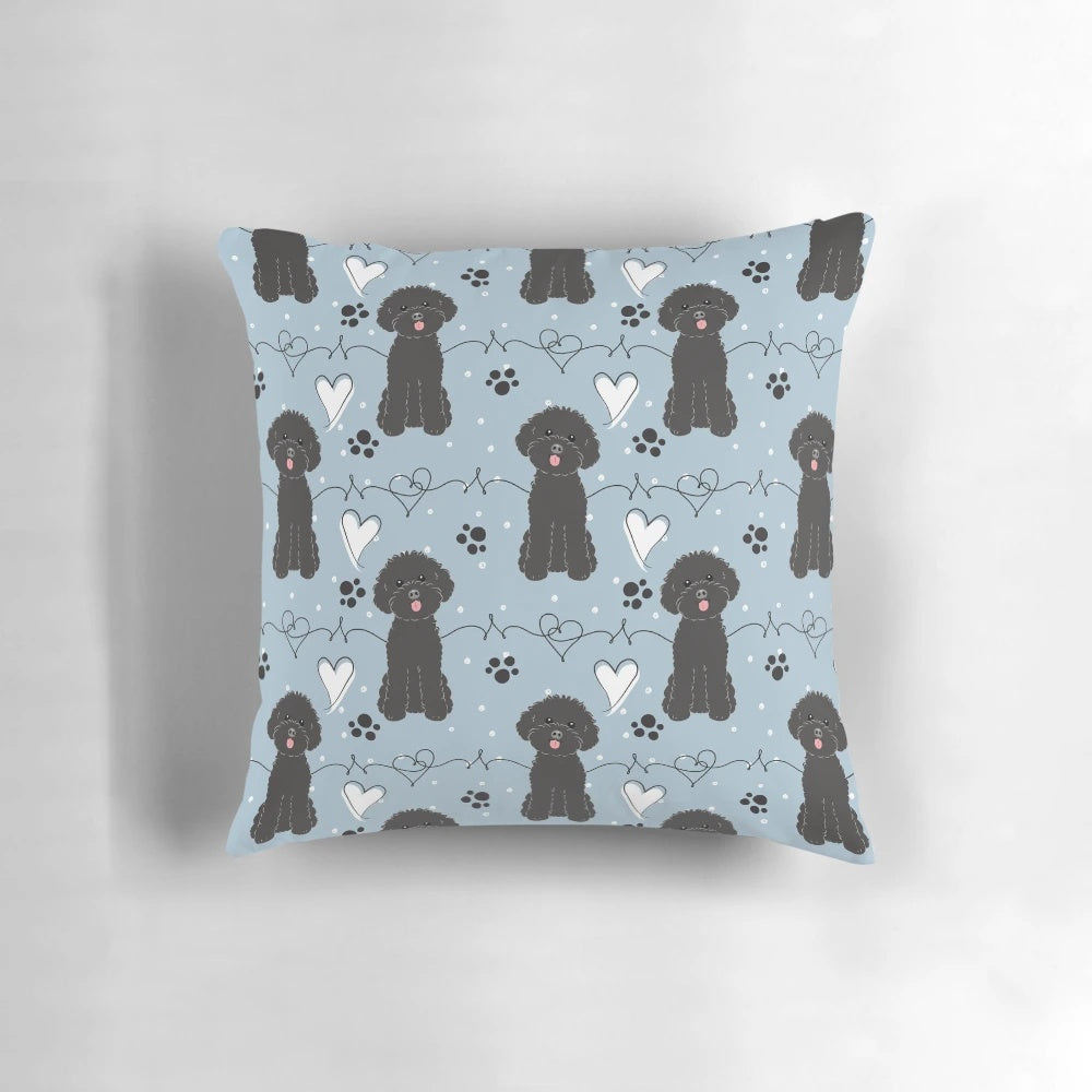 Soft, cuddly toy poodle pillow featuring a black poodle with a loving expression.