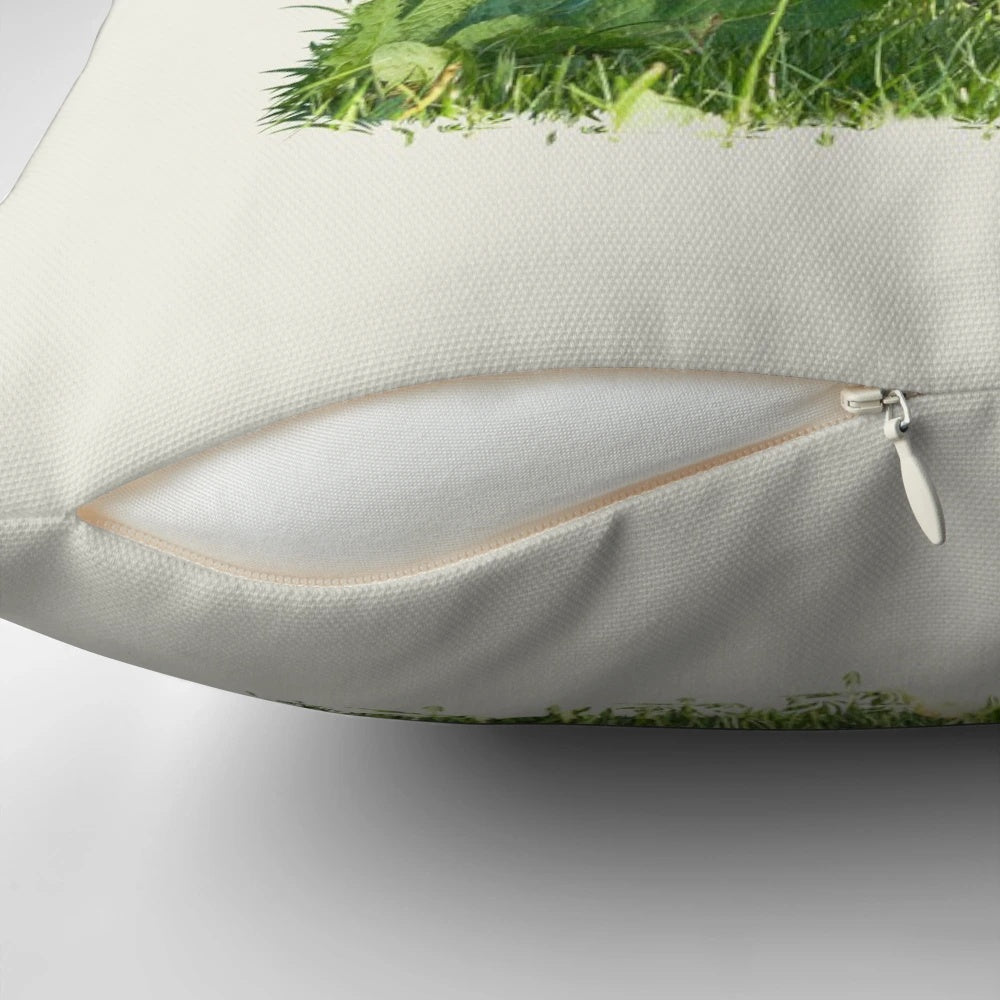 A soft, plush pillow featuring an adorable Valais Blacknose sheep lamb in a beautiful natural meadow setting.