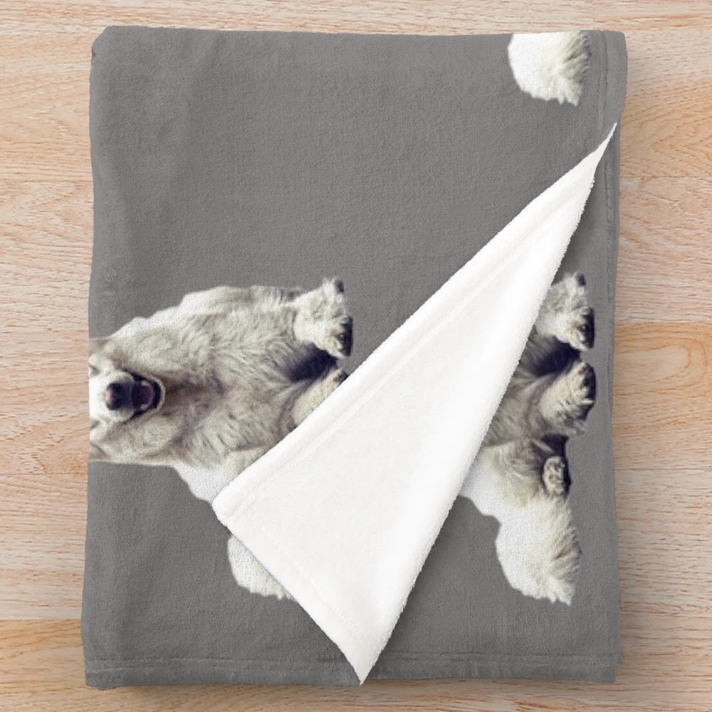 A soft and cozy plush blanket featuring a white Swiss shepherd dog