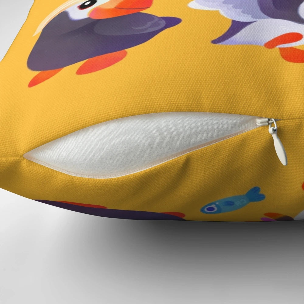 A soft, yellow throw pillow featuring a cute, kawaii puffin bird design