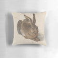 Soft, plush pillow featuring the famous "Young Hare" painting by Albrecht Dürer