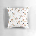 Pillow featuring a colorful pattern of zebra finches and flowers