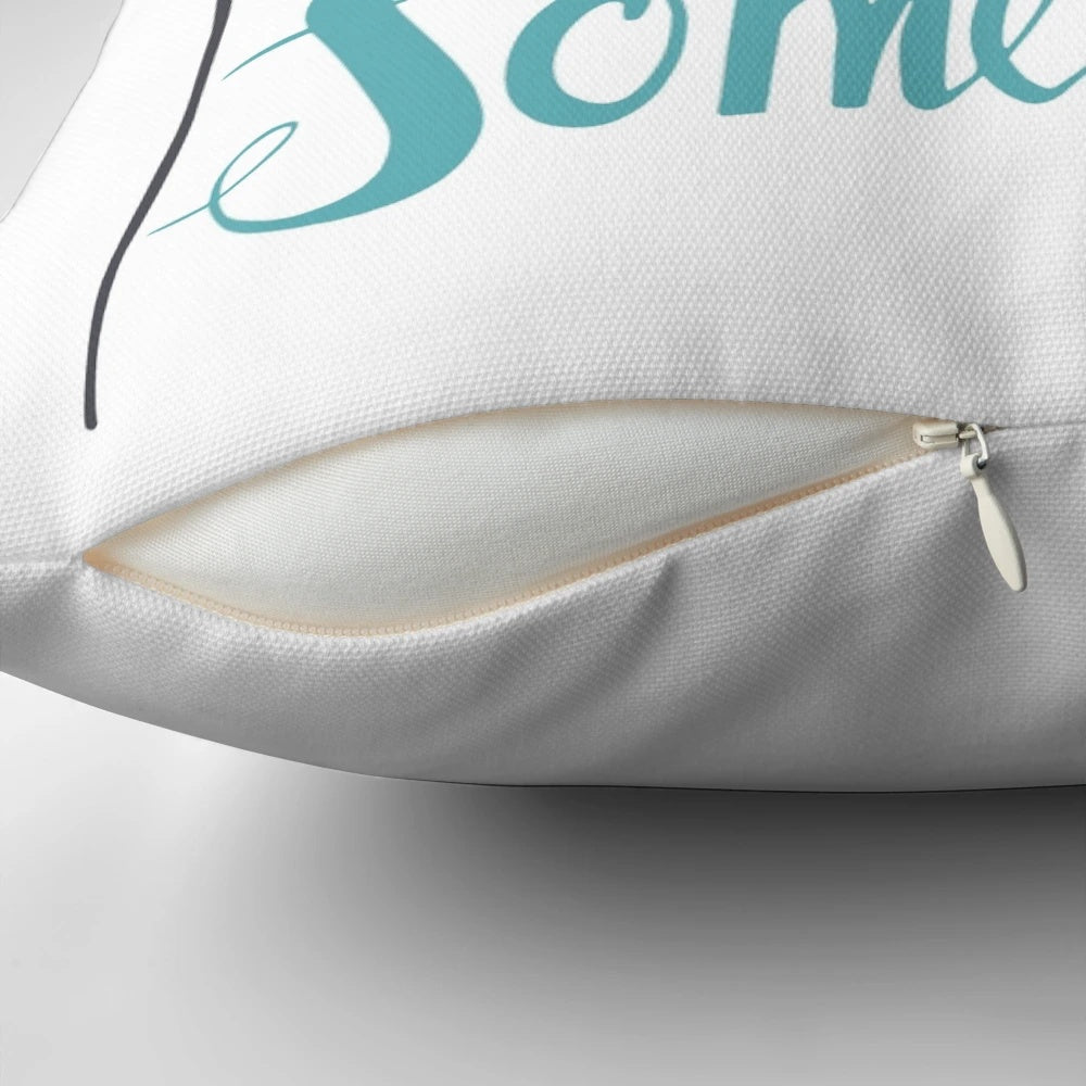 Decorative adventure-themed pillow with hand-lettered inspirational quote