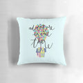 Colorful decorative pillow featuring hand-lettered "Adventure is out there" design inspired by the Disney Pixar movie Up.