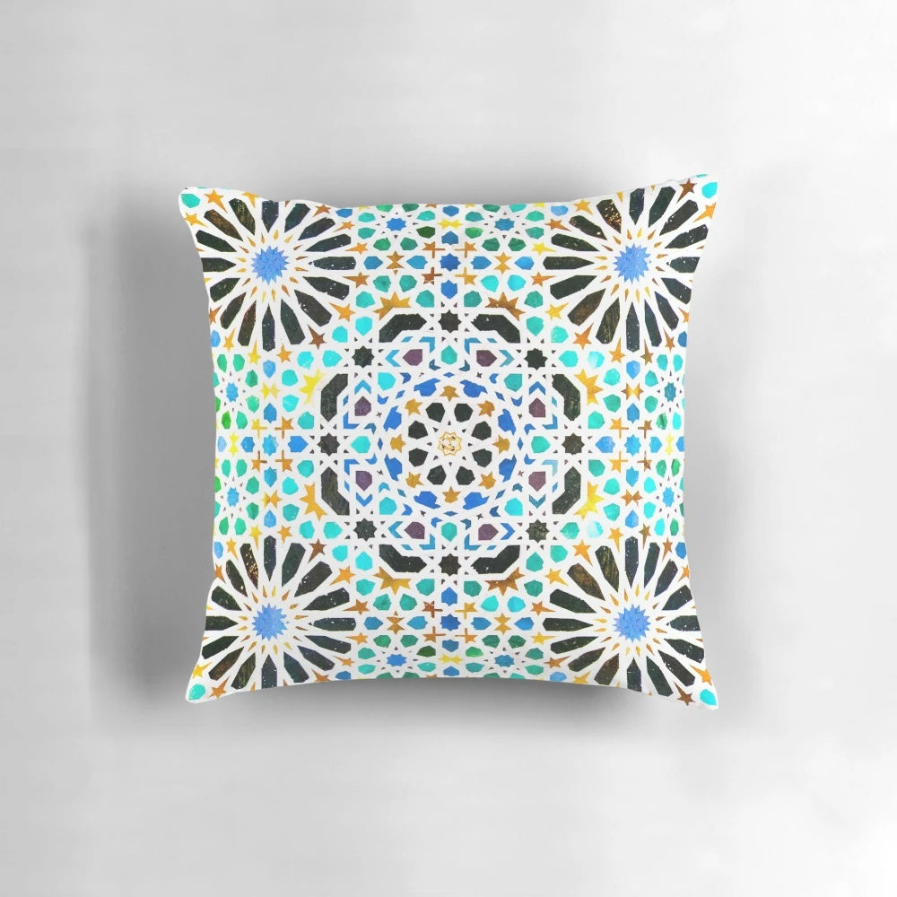 Alhambra-inspired geometric mosaic pattern on a decorative pillow