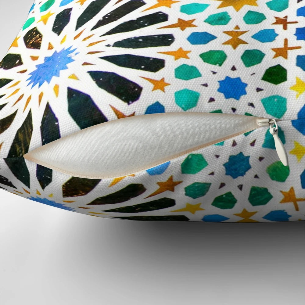 Alhambra-inspired geometric mosaic pattern on a decorative pillow