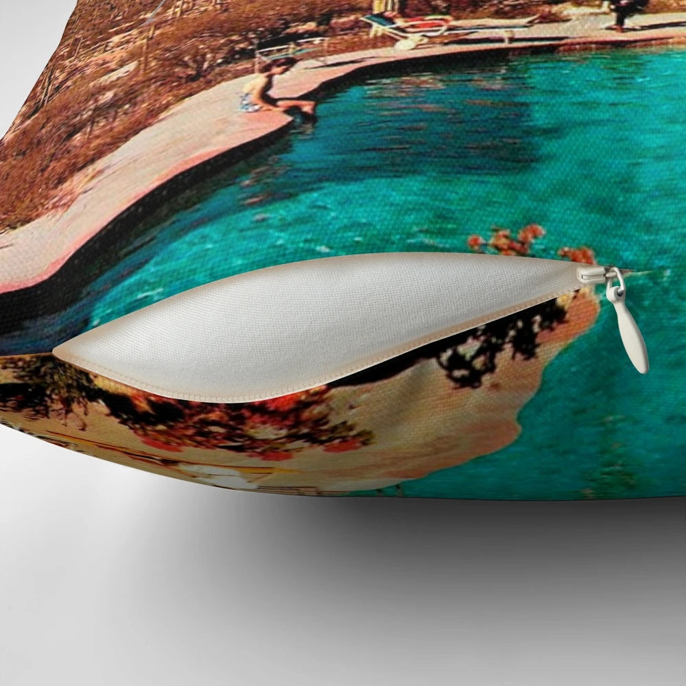 Throw pillow featuring a vibrant, photorealistic image of a UFO landing in a desert landscape with cacti and a pink sunset sky.