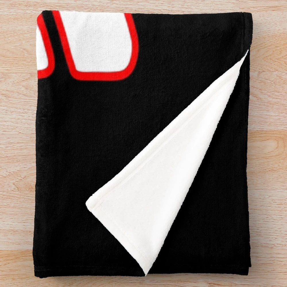 Alien-themed plush blanket with racing design