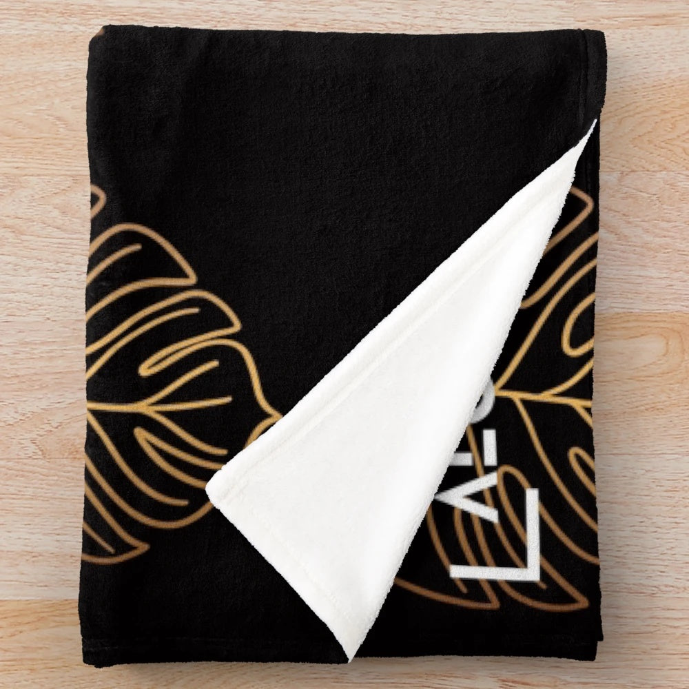 Aloha Gold Plush Blanket with Tropical Leaf Design