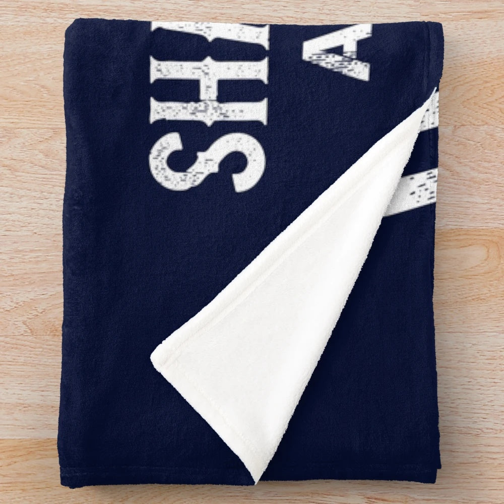 Vintage-style plush blanket inspired by the classic movie Jaws, featuring a shark fishing scene